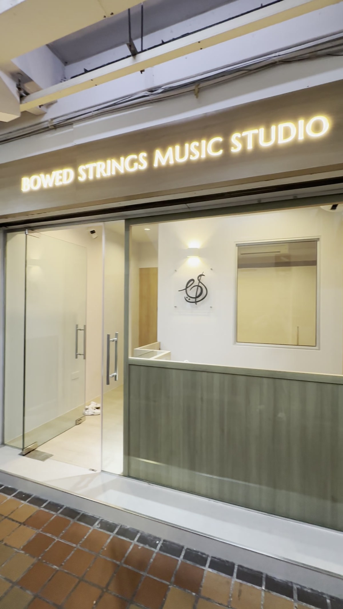 A student practising the violin at Bowed Strings
